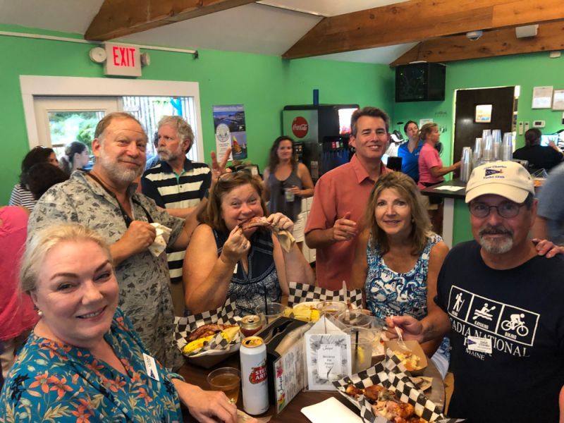 picture of folks enjoying thier meal at a table in the Jackspot