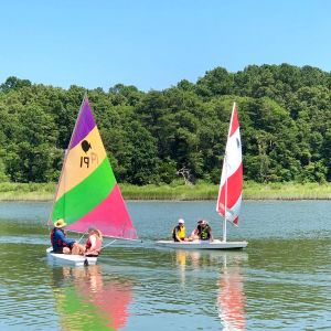 rainbow and red sunfish boats