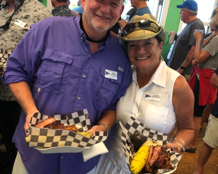 picture of couple in the Jackspot with food