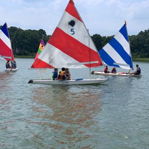 4 sets of campers on the water