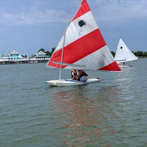 2 campers in red and white sunfish 5