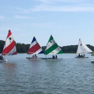 five boats on the water