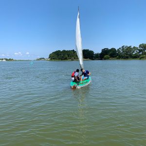 2-older-campers-in-the-green-boat.jpg