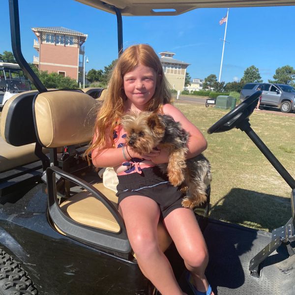 girl-and-dog-in-golf-cart-7437.jpg