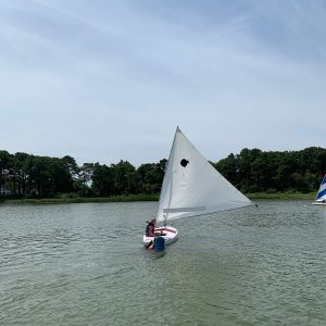 camper-fixes-the-rudder-in-the-water.jpg