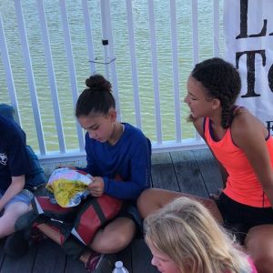 campers with beach ball