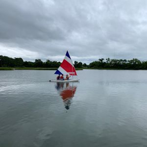 3-campers-in-the-red-white-and-blue-boat.jpg